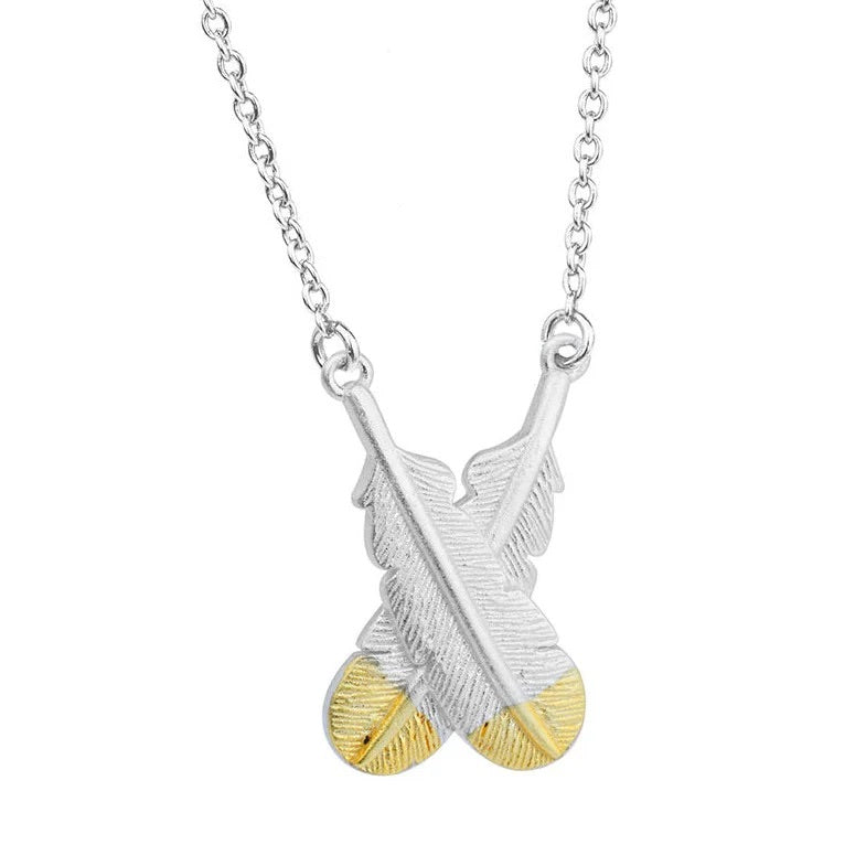 LITTLE TAONGA CROSSED FEATHER NECKLACE